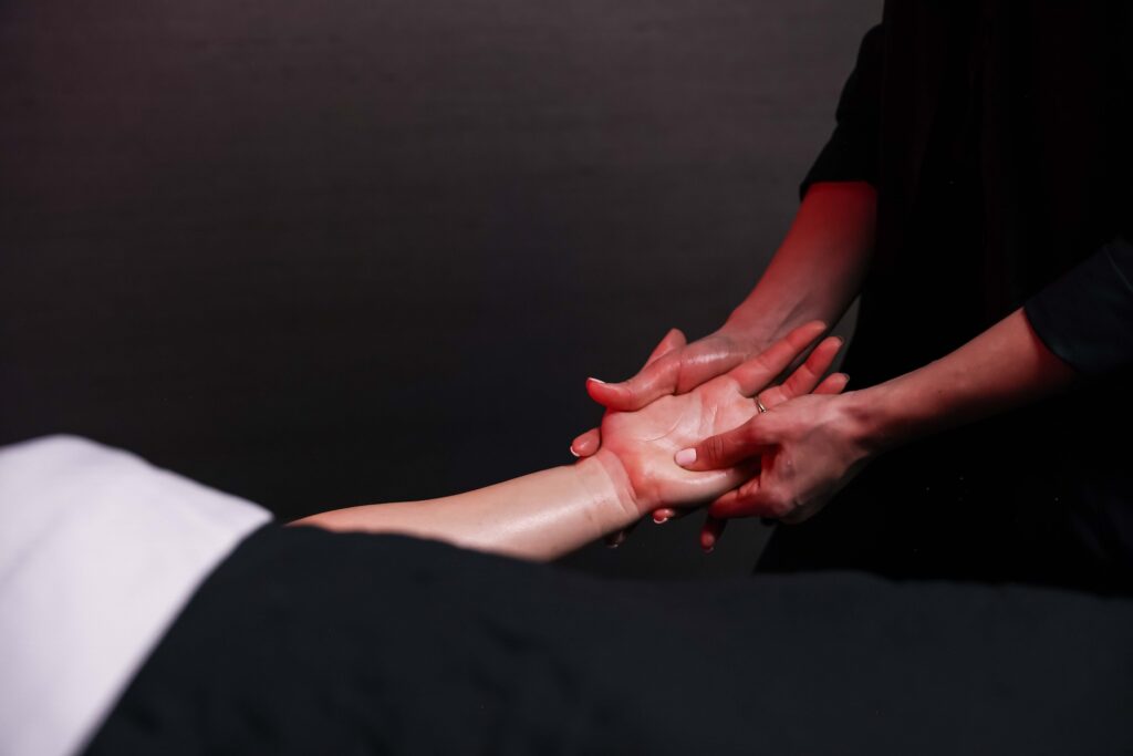 A patient receives a relaxing hand massage as part of their Platinum level Hydrafacial. Personalization of treatment is another one of the benefits of a Hydrafacial in Scottsdale.